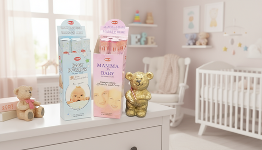 Packaging of Hem Incense Sticks with 'Baby Powder' and 'Mamma & Baby' fragrances, featuring images of a baby and a mother holding a baby.