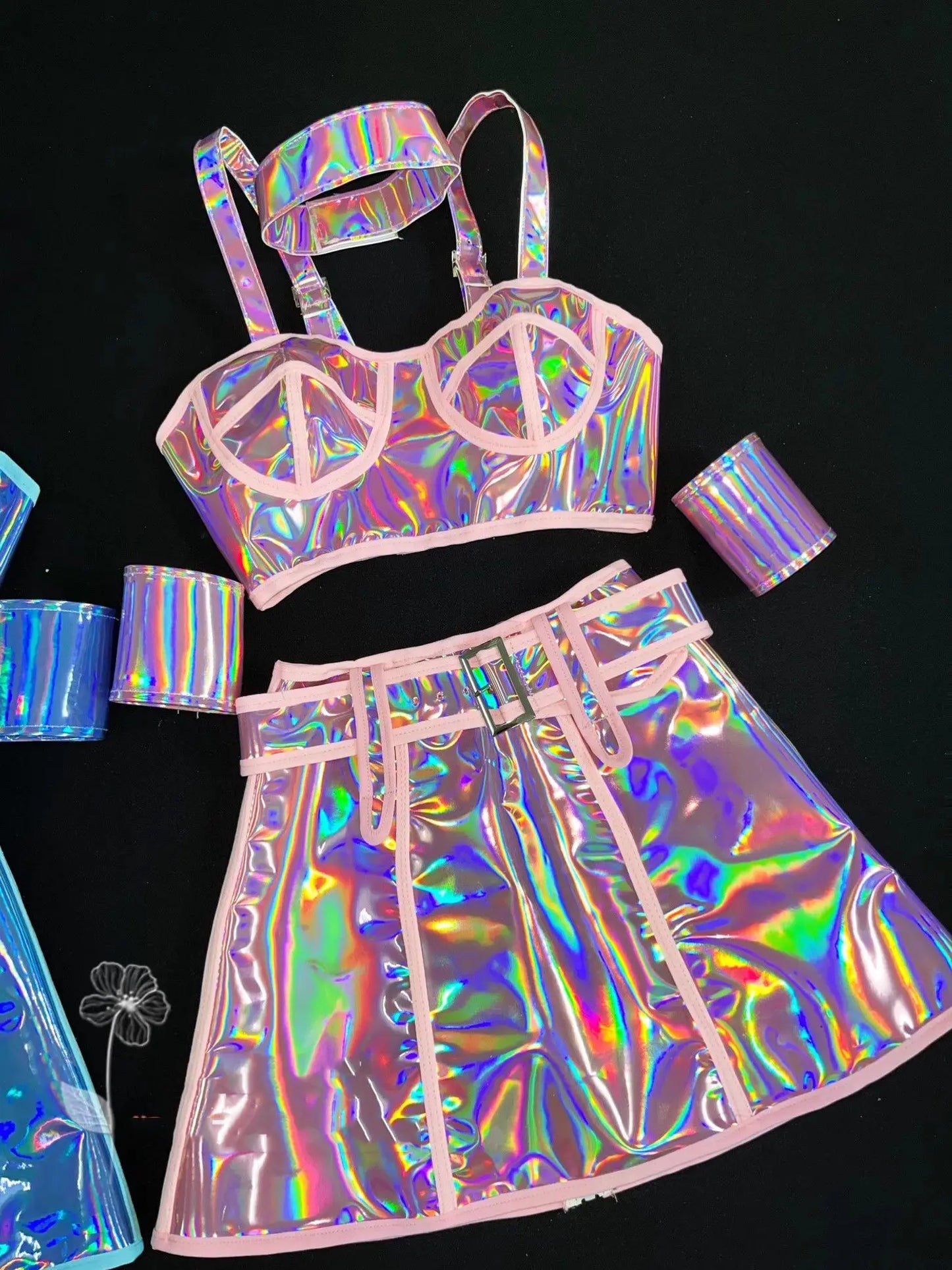 Holographic outfit with top and skirt on a black background