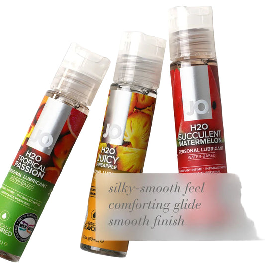 Three bottles of JO H2O lubricant with colorful packaging on a textured white background.