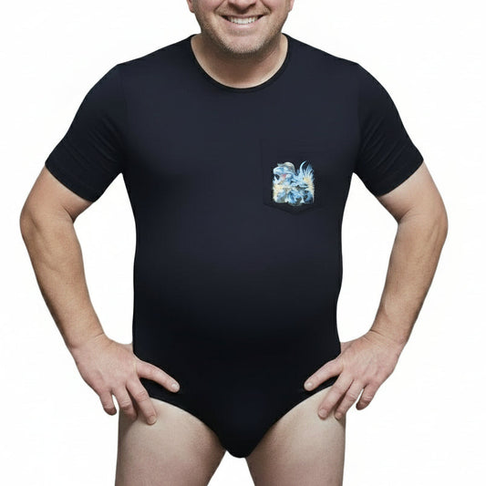 Man wearing black dinosaur monster truck onesie with dinosaur background