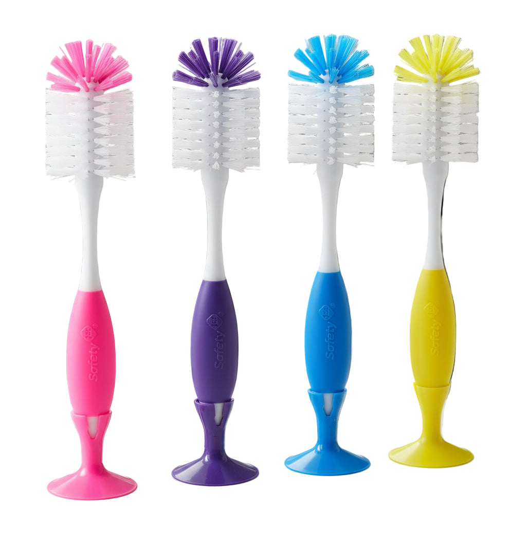 Four colorful bottle brushes with different colored handles on a white background