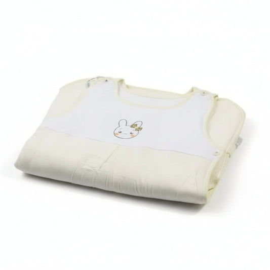 White adult sleeper with a cartoon bunny design on a light blue background