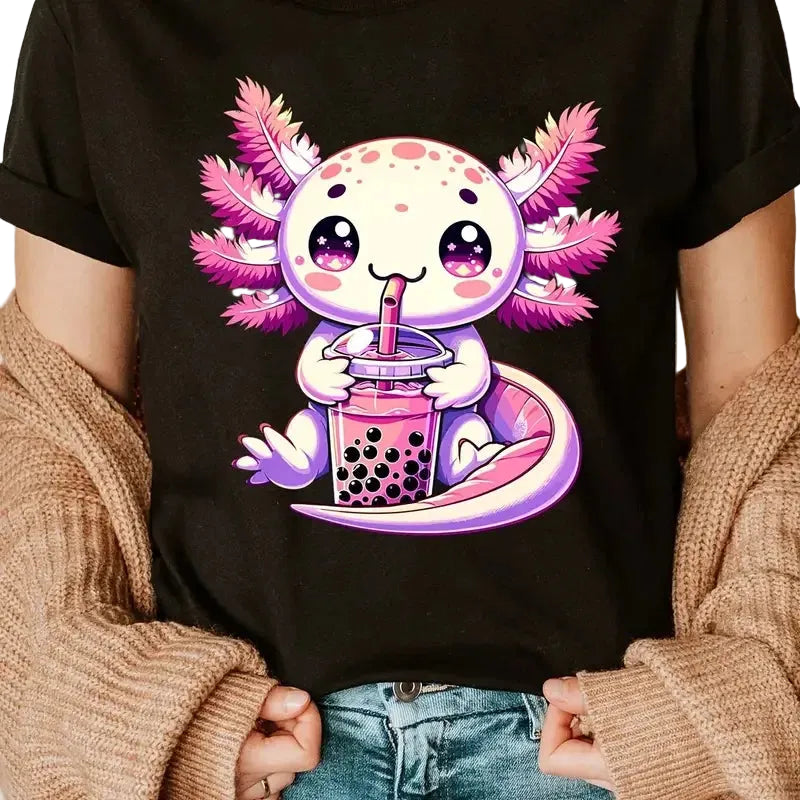 Person wearing a black t-shirt with a cute axolotl design drinking bubble tea.