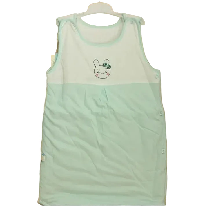 Light green baby romper with a white background
