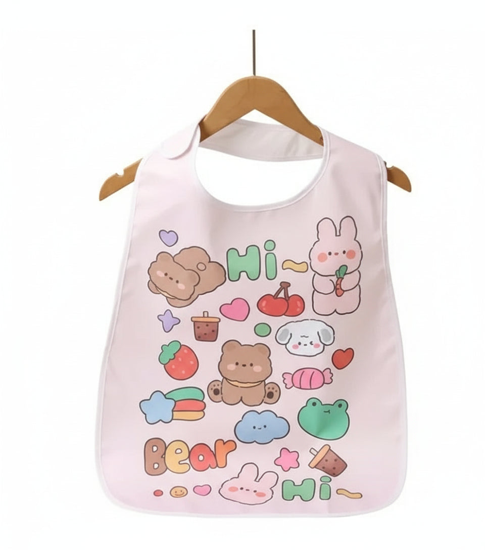 Pink bib with cartoon characters and text on a wooden hanger against a white background