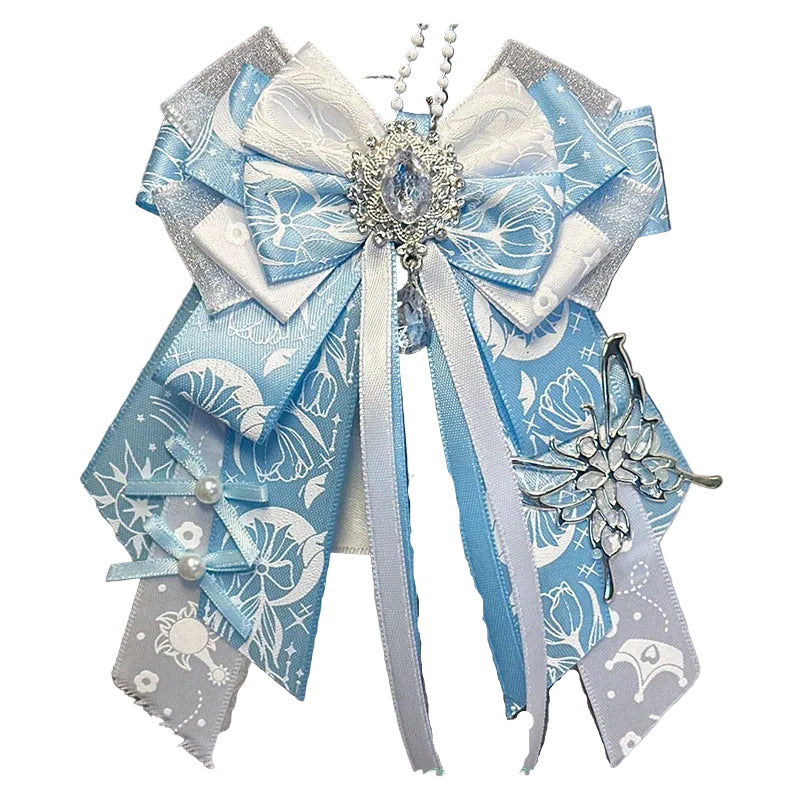 Decorative bow with blue and white ribbons and decorative elements on a car seat.