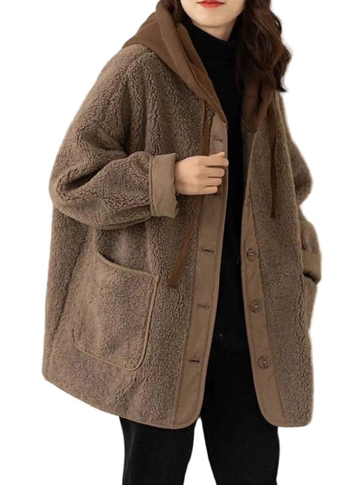 Brown fleece coat worn by a person on a neutral background