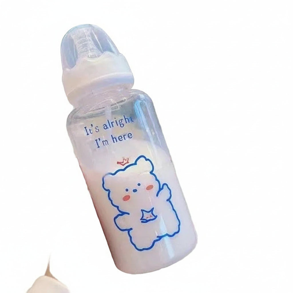 Baby bottle with a cartoon bear design and text on a white background