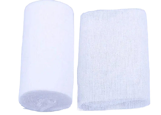 Roll of white gauze bandage on a light purple background