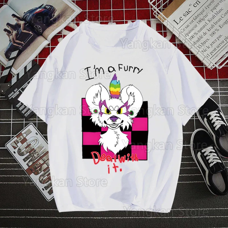White t-shirt with a graphic design of a fox with rainbow hair and text on a red and black checkered background.