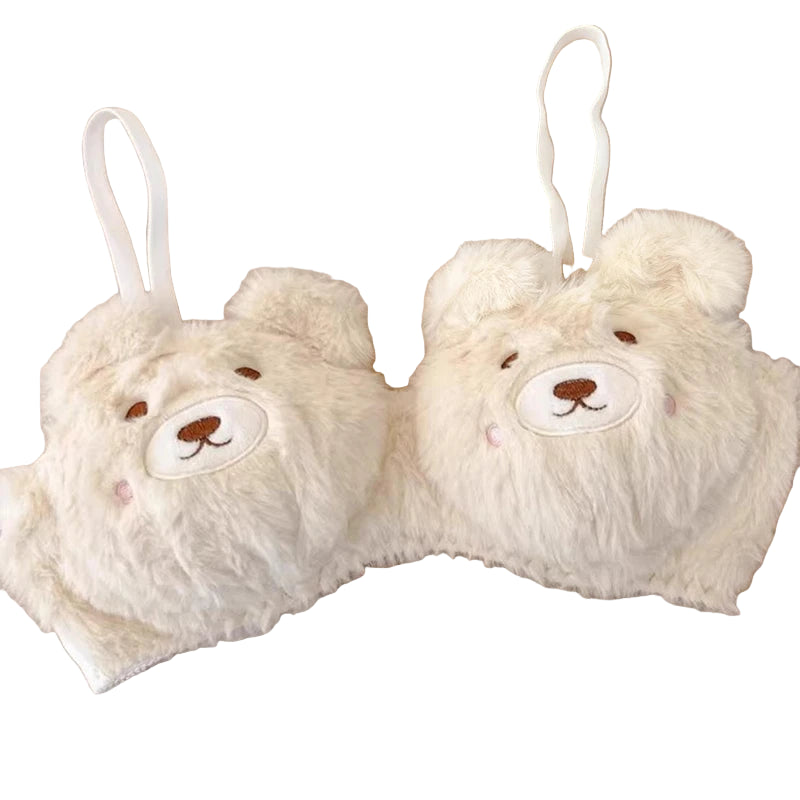 Fluffy bear-shaped bra and panties set on a soft beige background