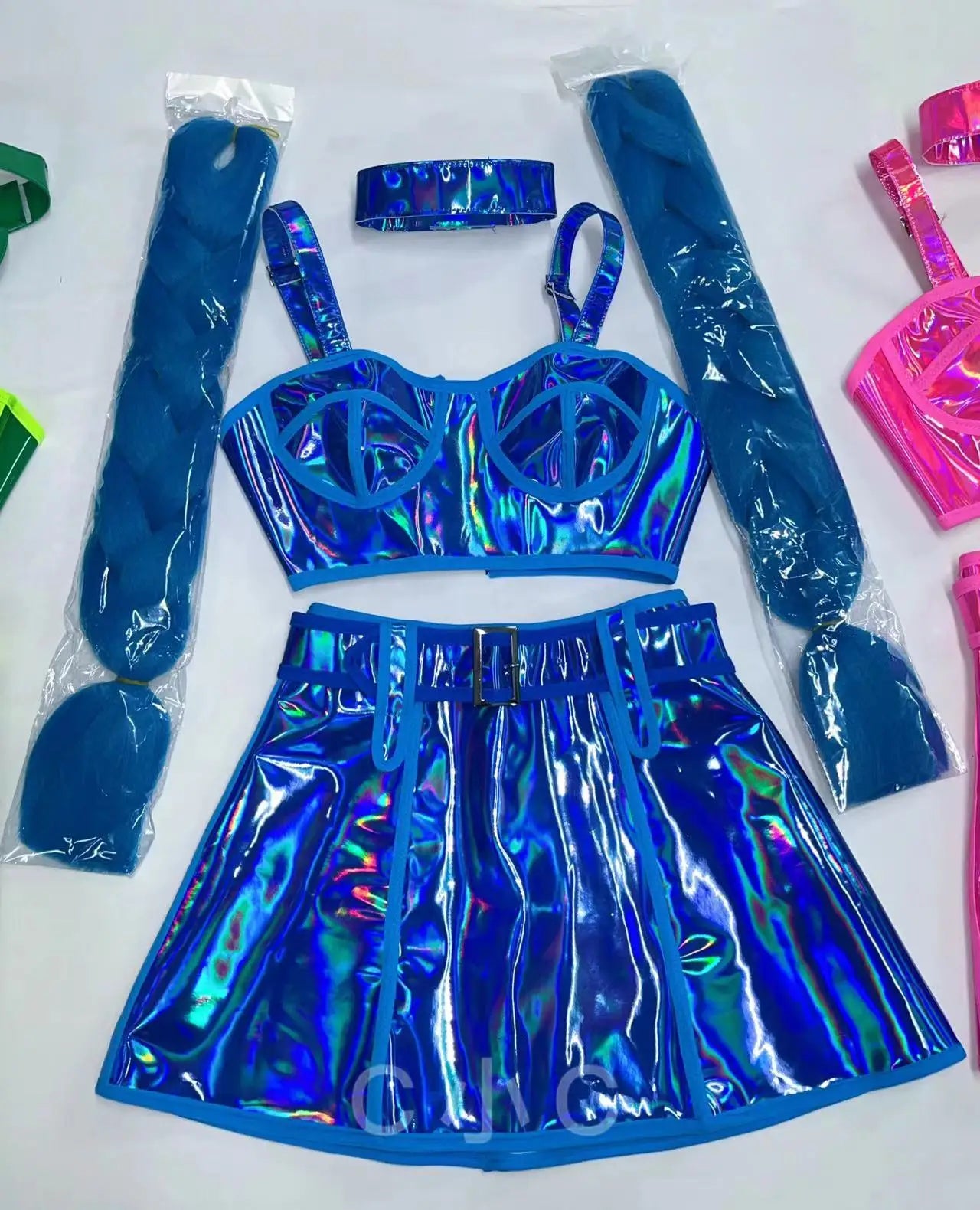 Blue holographic top and skirt set with accessories on a white background