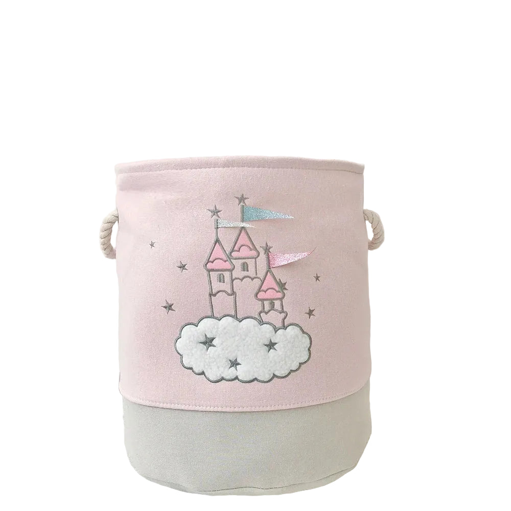 Pink storage basket with castle design on a white surface