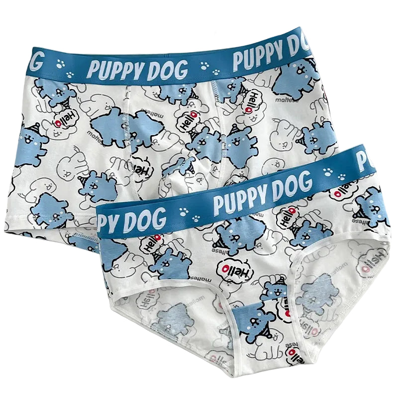 Pair of children's underwear with blue 'Puppy Dog' waistband on a white surface.