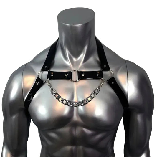 Black leather harness with chain on a mannequin against a gray background
