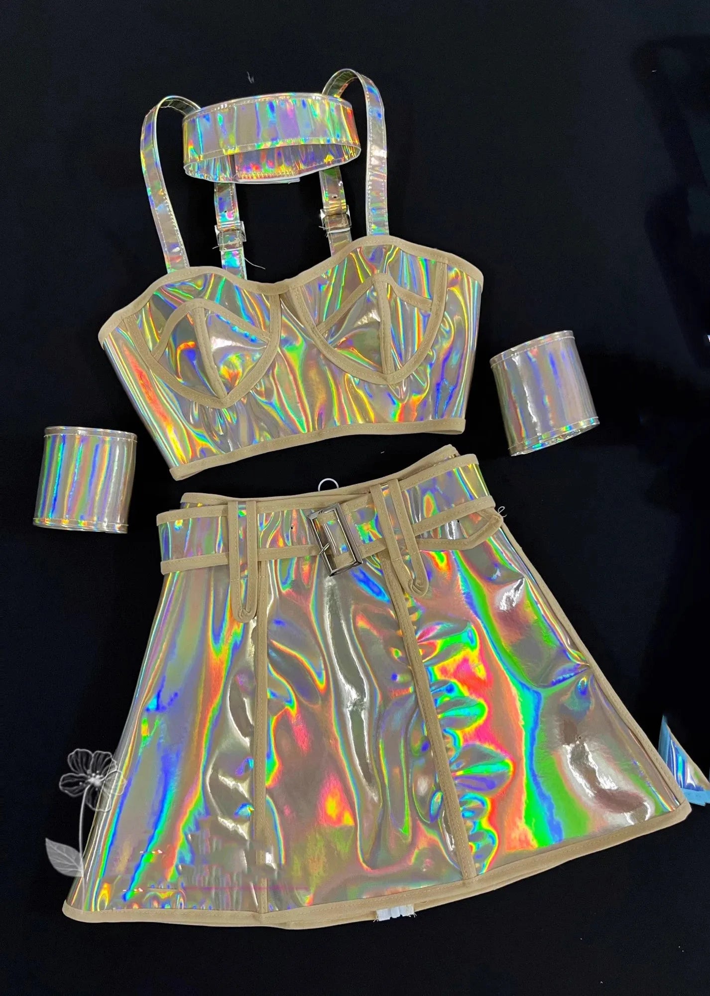 Holographic outfit with top and skirt on a black background