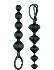 Two black beaded keychains on a green background