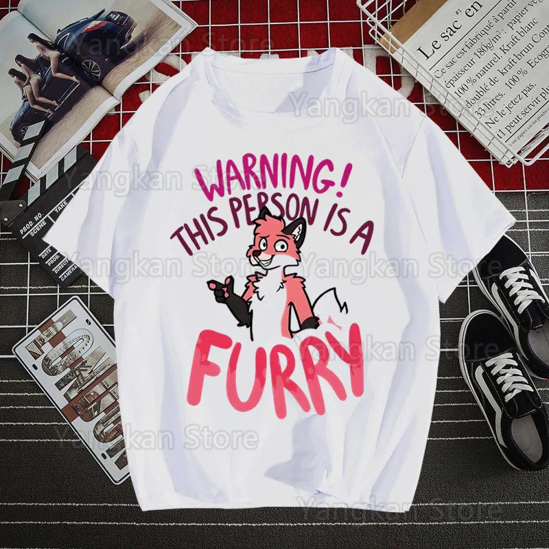 White t-shirt with pink and black graphic and text on a grid background