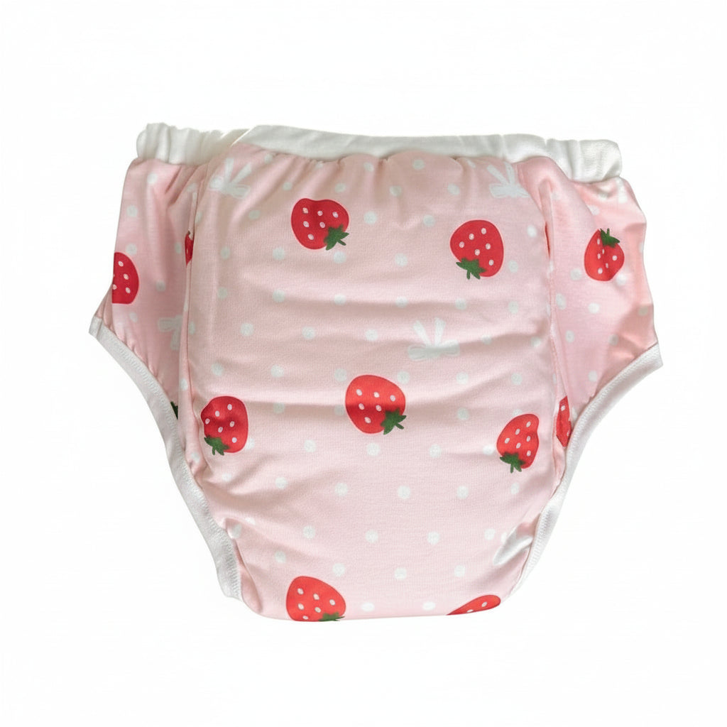 Pink diaper with strawberry pattern on a white background