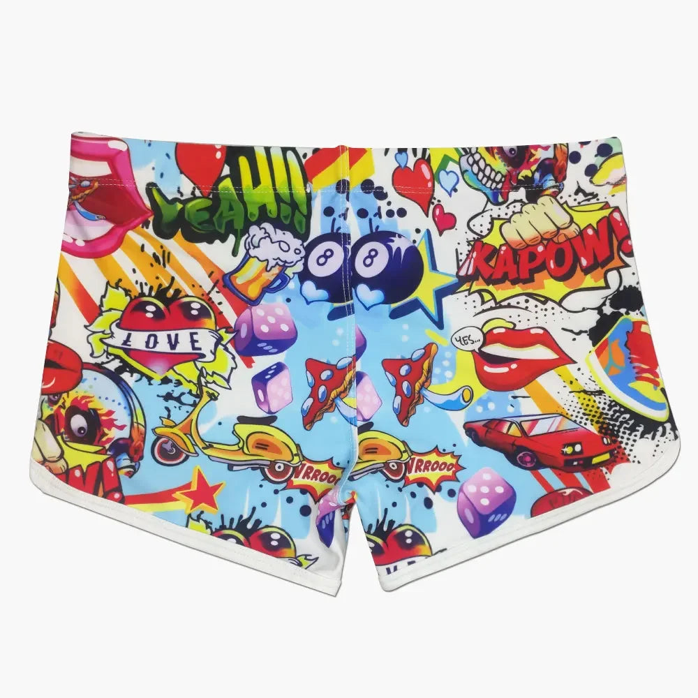 Colorful shorts with comic book-style graphics on a white background